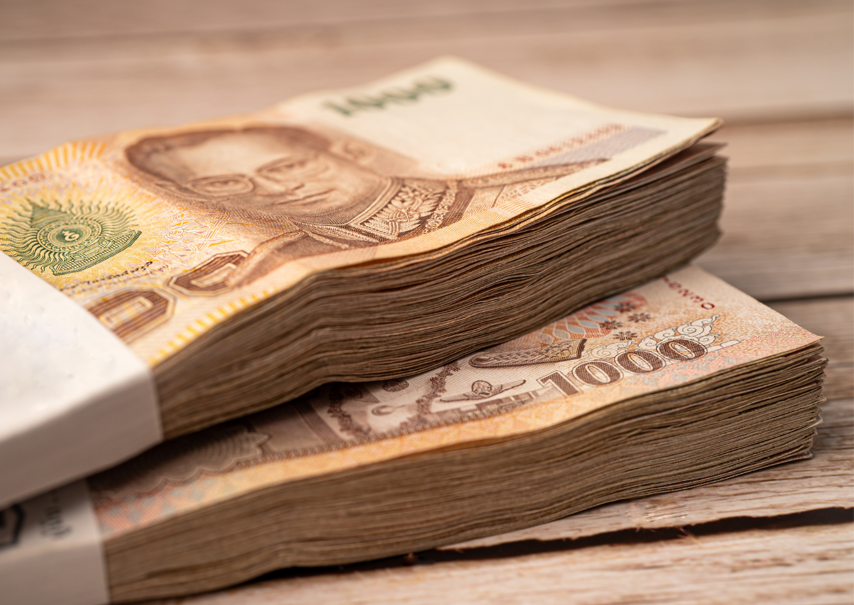 Курс Тайского бата крепчает